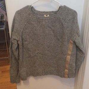 Grey sweater with gold lines on the sides